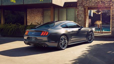 Sleek Mustang GT in Suburban Bliss wallpaper