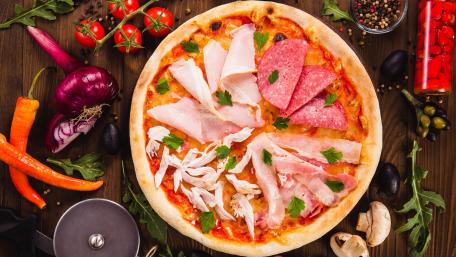 Sumptuous Delight of a Meat Lover's Pizza wallpaper