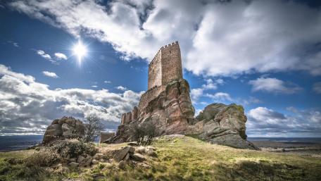 Majestic Castillo de Zafra on Rocky Throne wallpaper