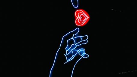 Neon Love Embrace in Darkness wallpaper