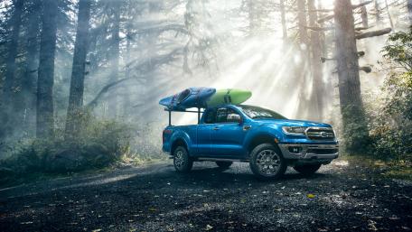 Adventure Awaits with Ranger Pickup and Kayaks wallpaper