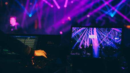 Electrifying Beats Under Mesmerizing Lights wallpaper