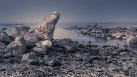 Misty Seascape with Rocky Outcrops wallpaper
