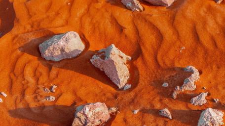 Stones Resting on Warm Desert Sands wallpaper