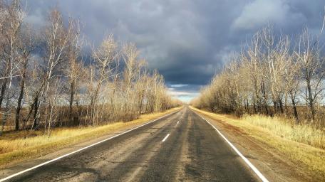 Lonely Road Beneath Stormy Skies wallpaper