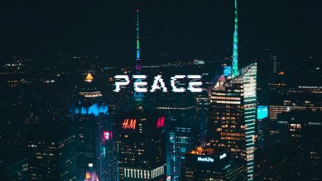 Illuminated Message of Harmony in the Metropolis wallpaper