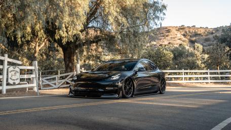 Tesla Model 3 Elegance on the Road wallpaper