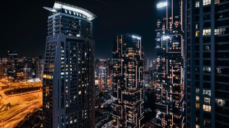 Stunning Nightview of Urban Skyscrapers and City Lights wallpaper