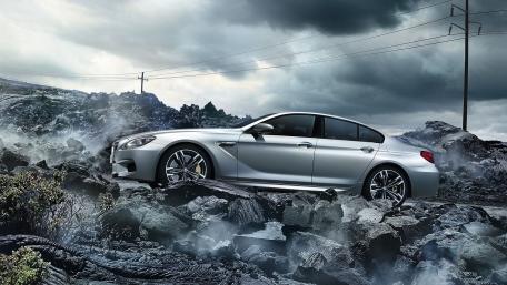 Sleek BMW M6 Gran Coupe Dominates Rugged Terrain wallpaper