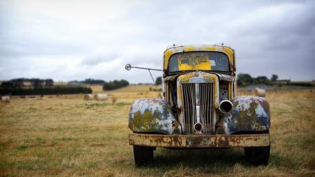 Rustic Charm of Abandoned Automotive Timepiece wallpaper