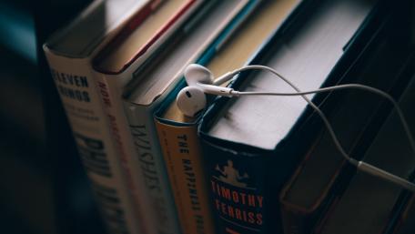 Melodic Knowledge Amidst Pages wallpaper