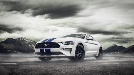 Majestic Mustang Power on Stormy Horizon wallpaper