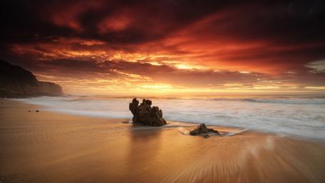 Serene Sunset Seashore Silhouette wallpaper