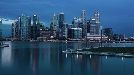 Twilight Brilliance Over Urban Waterscape wallpaper