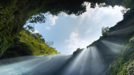 Enchanted Rays at Madakaripura Waterfall wallpaper