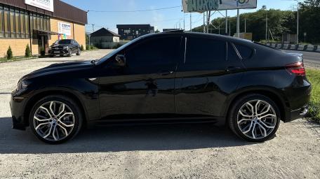Sleek Black BMW X6 Wallpaper wallpaper