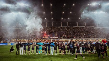 Electric Atmosphere at a Nighttime Soccer Match wallpaper