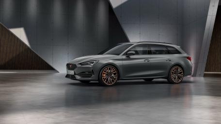 Sleek Cupra Leon in Modern Setting wallpaper