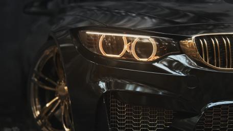 Gleaming Gaze of a Black BMW M4 wallpaper