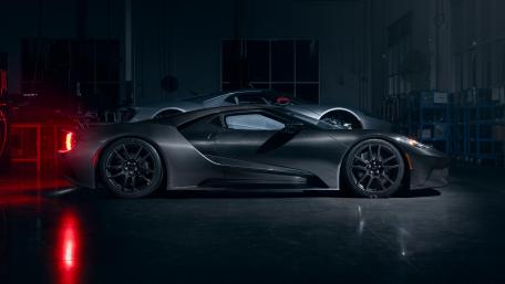 Sleek Ford GT in a Dark Garage Setting wallpaper