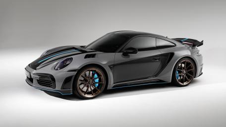 Sleek Black Porsche Against White wallpaper