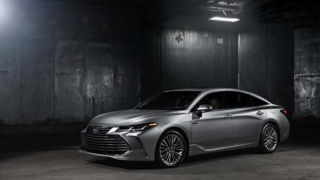 Sleek Toyota Avalon in a Dark Garage wallpaper