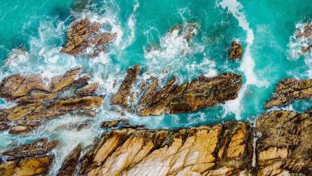Aerial Majesty of Rocky Seashore wallpaper