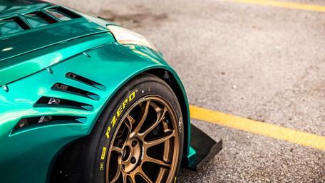 Stunning Nissan 350Z in Vibrant Teal Shade wallpaper