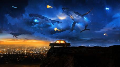 Floating Whales Over Dreamland wallpaper