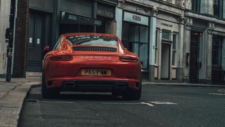 Red Porsche 911 on City Street wallpaper
