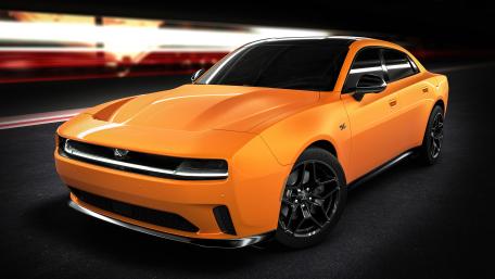 Orange Dodge Charger on Display wallpaper