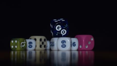 Dice in the Dark with Vibrant Colors and Shapes wallpaper