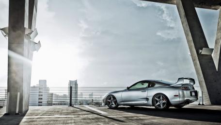 Silver Sports Car in Urban Loft wallpaper