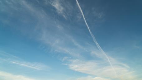 Tranquil Sky with Contrails wallpaper