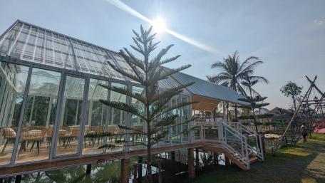 Modern Greenhouse Amidst Thai Serenity wallpaper