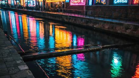 Neon Reflections in Urban Canal wallpaper