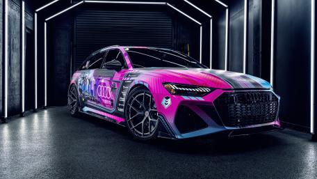 Vibrant Audi RS 6 in Neon Light Tunnel wallpaper