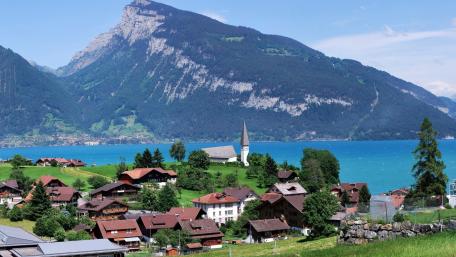 Charming Swiss Village by Lake Thun wallpaper