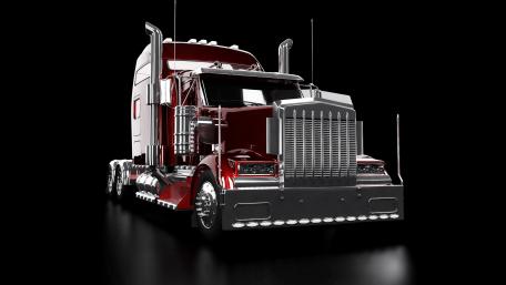 Sleek Semi-Truck on Black Background in 4K Resolution wallpaper