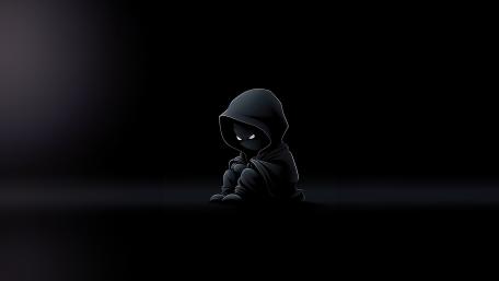 Enigmatic Hooded Boy in Darkness wallpaper