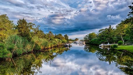 Tranquil River Reflection Scene wallpaper