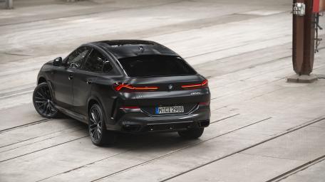 BMW X6 in Industrial Setting wallpaper