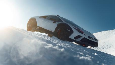 Lamborghini Huracan Sterrato in Snowy Mountains wallpaper