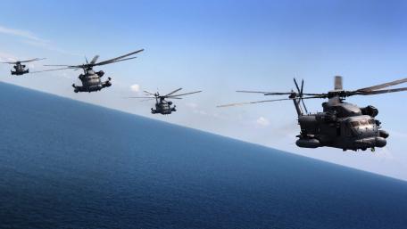 Military Patrol Over the Ocean Horizon wallpaper