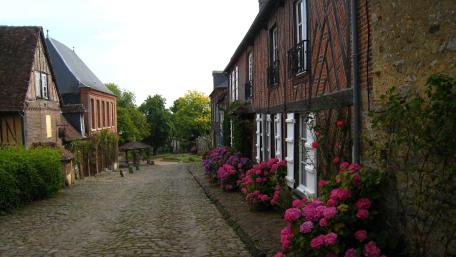 Charming Cobblestone Street in a Quaint Town wallpaper