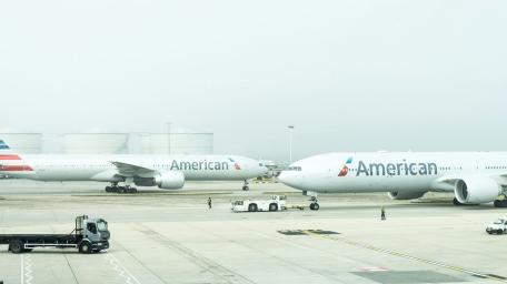 Airplanes at the Terminal in Misty Atmosphere wallpaper