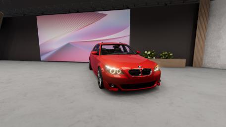 Sleek Red BMW in Modern Setting wallpaper