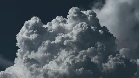 Calm Before the Storm: Majestic Clouds in Motion wallpaper