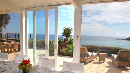 Luxurious Oceanfront Villa Retreat with Pool and Terrace Views wallpaper