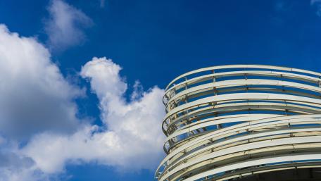 Modern Architectural Elegance Under Blue Sky wallpaper